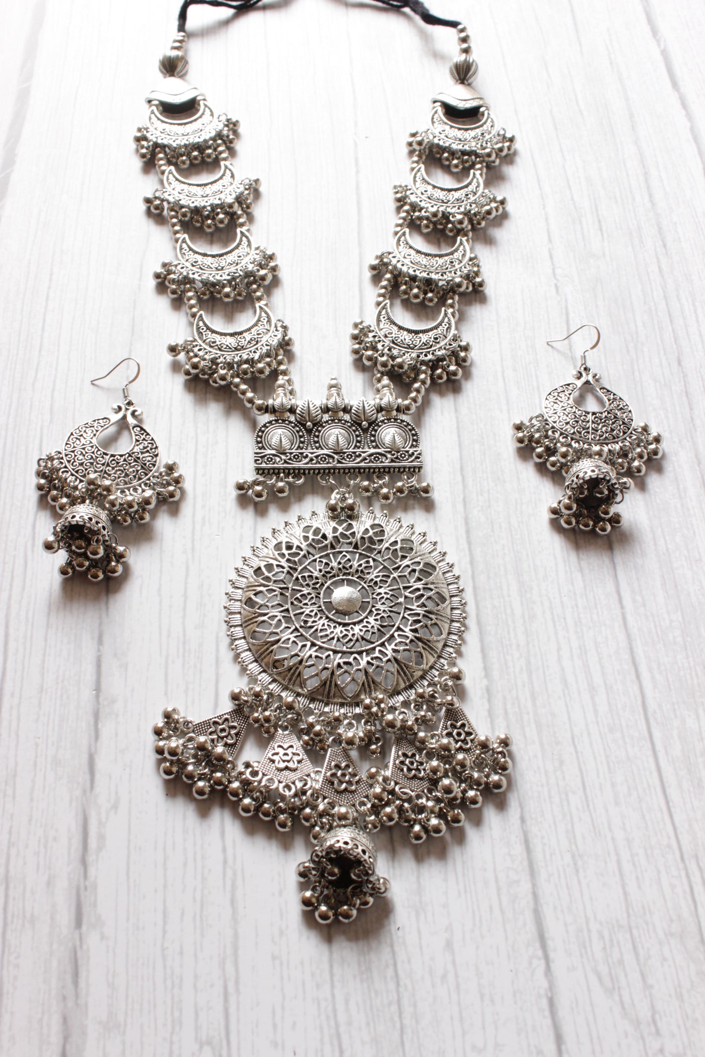 Long Silver Finish Metal Necklace Set with Intricate Detailing