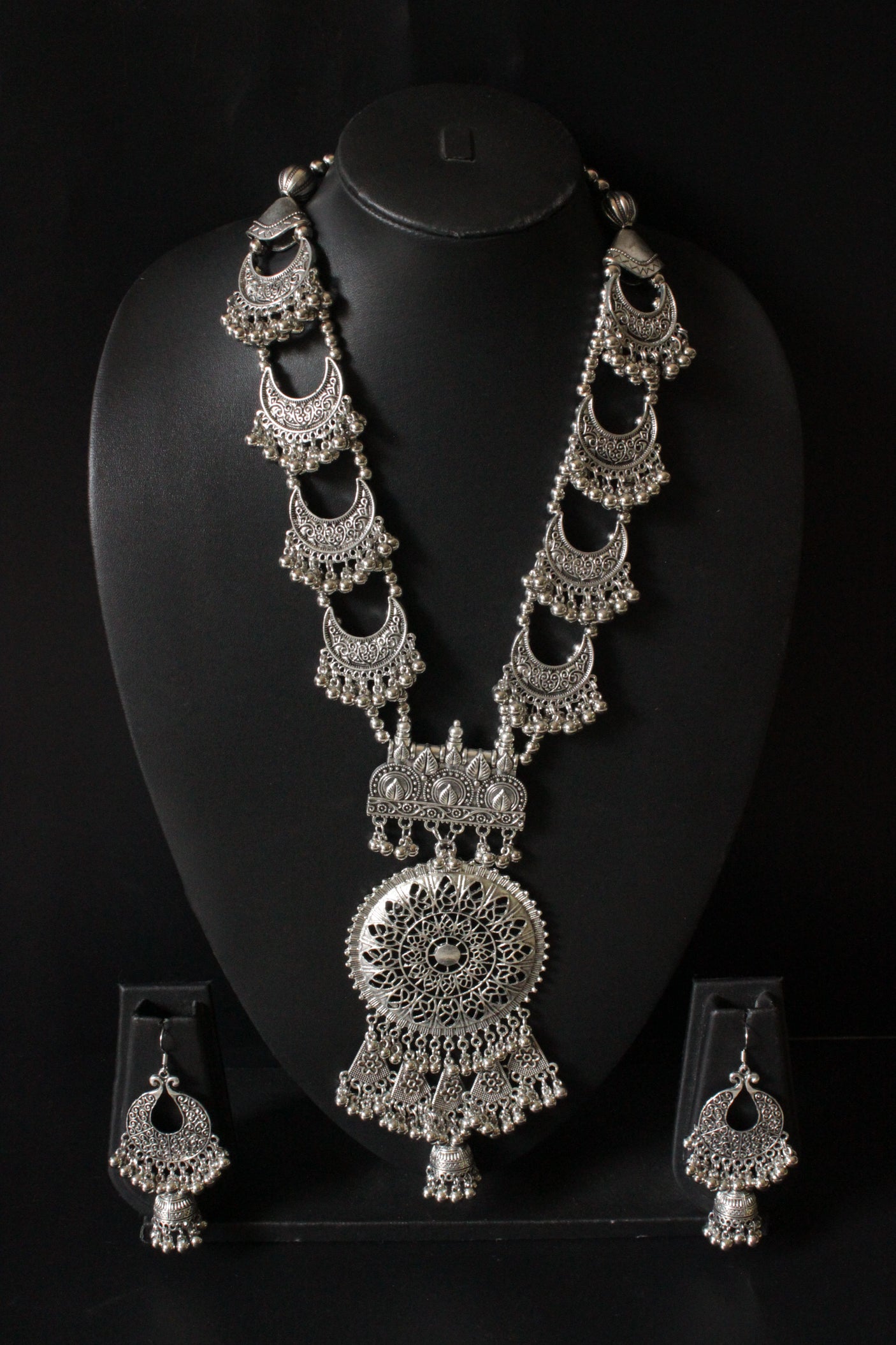 Long Silver Finish Metal Necklace Set with Intricate Detailing