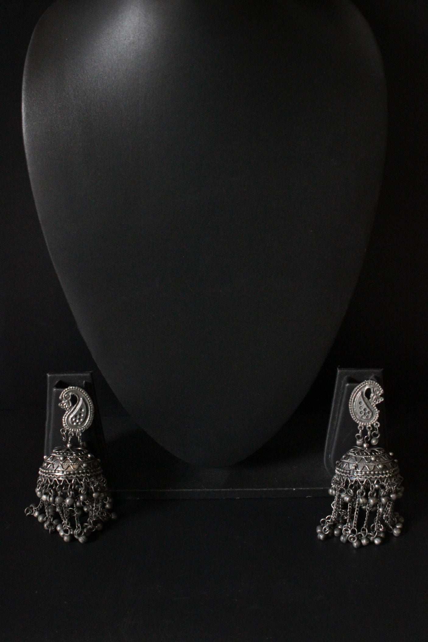 Peacock Motif Oxidised Finish Jhumka Earrings with Long Metal Beads Strands
