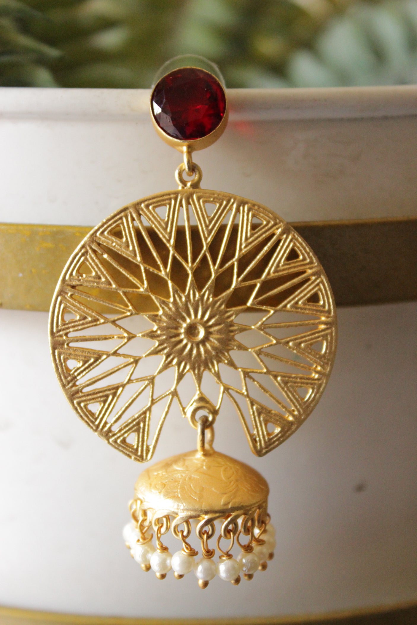 Red Natural Gemstone Embedded Gold Plated Intricately Detailed Jhumka Earrings