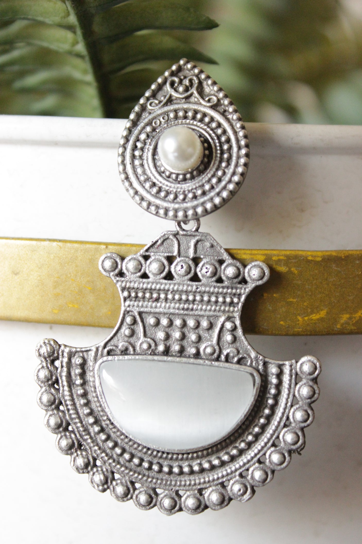 Ivory Glass Stone Embedded Premium Oxidised Finish Warrior Dangler Earrings