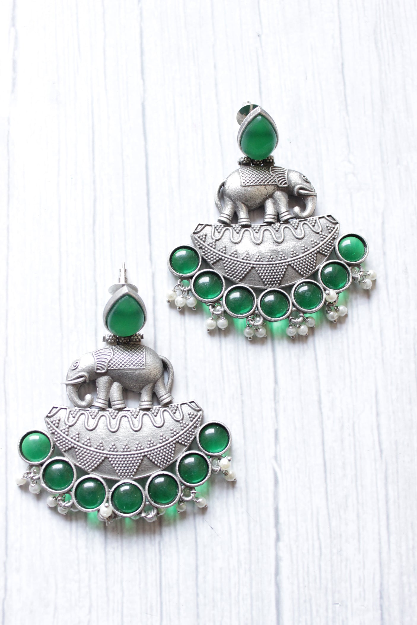 Bottle Green Glass Stones Embedded Premium Oxidised Finish Elephant Motif Dangler Earrings