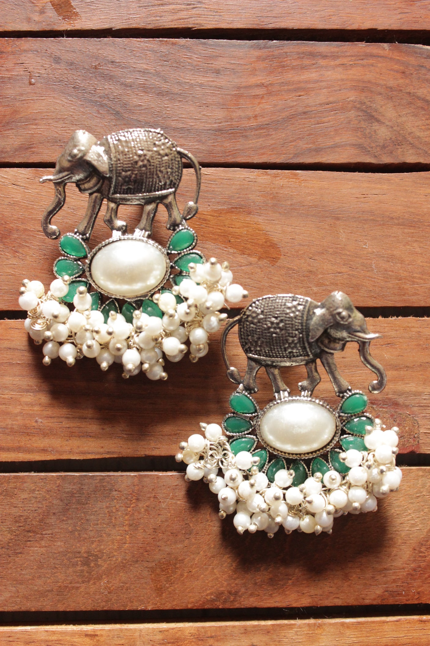Elephant Motif White Stone Centerpiece Green Stones Embedded Stud Earrings
