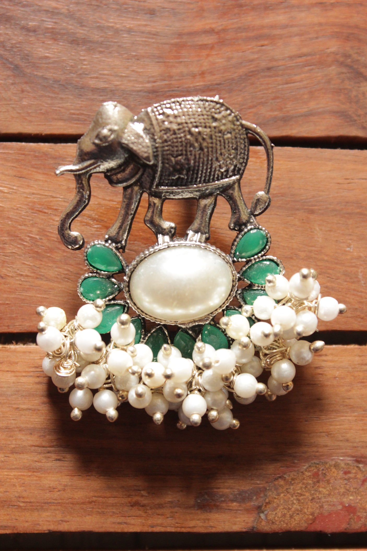 Elephant Motif White Stone Centerpiece Green Stones Embedded Stud Earrings