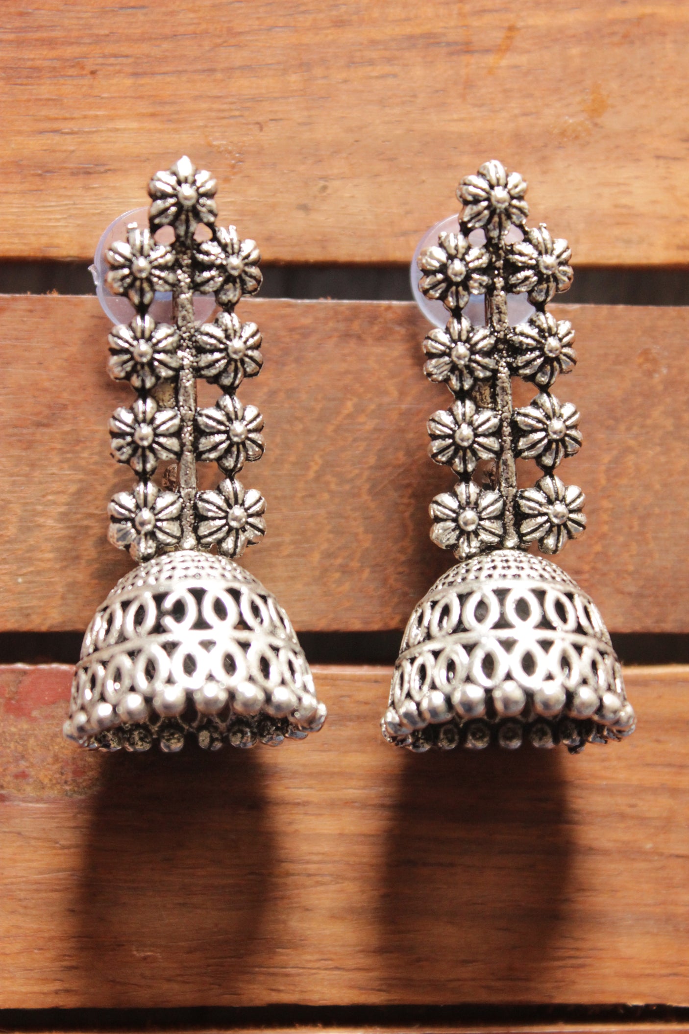 Premium Silver Finish Flower Motifs Jhumka Earrings