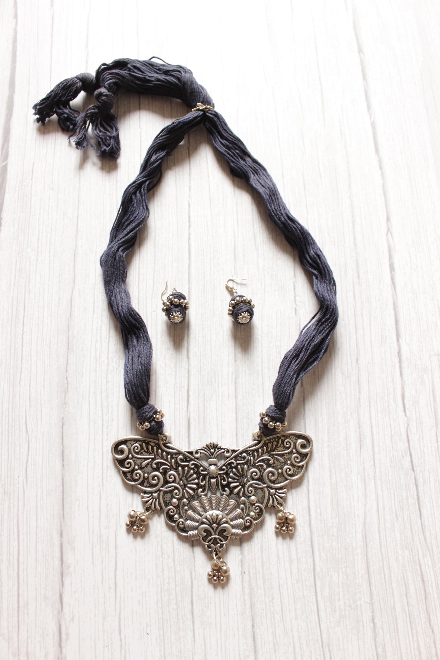 Intricately Detailed Butterfly Pendant Thread Closure Necklace Set