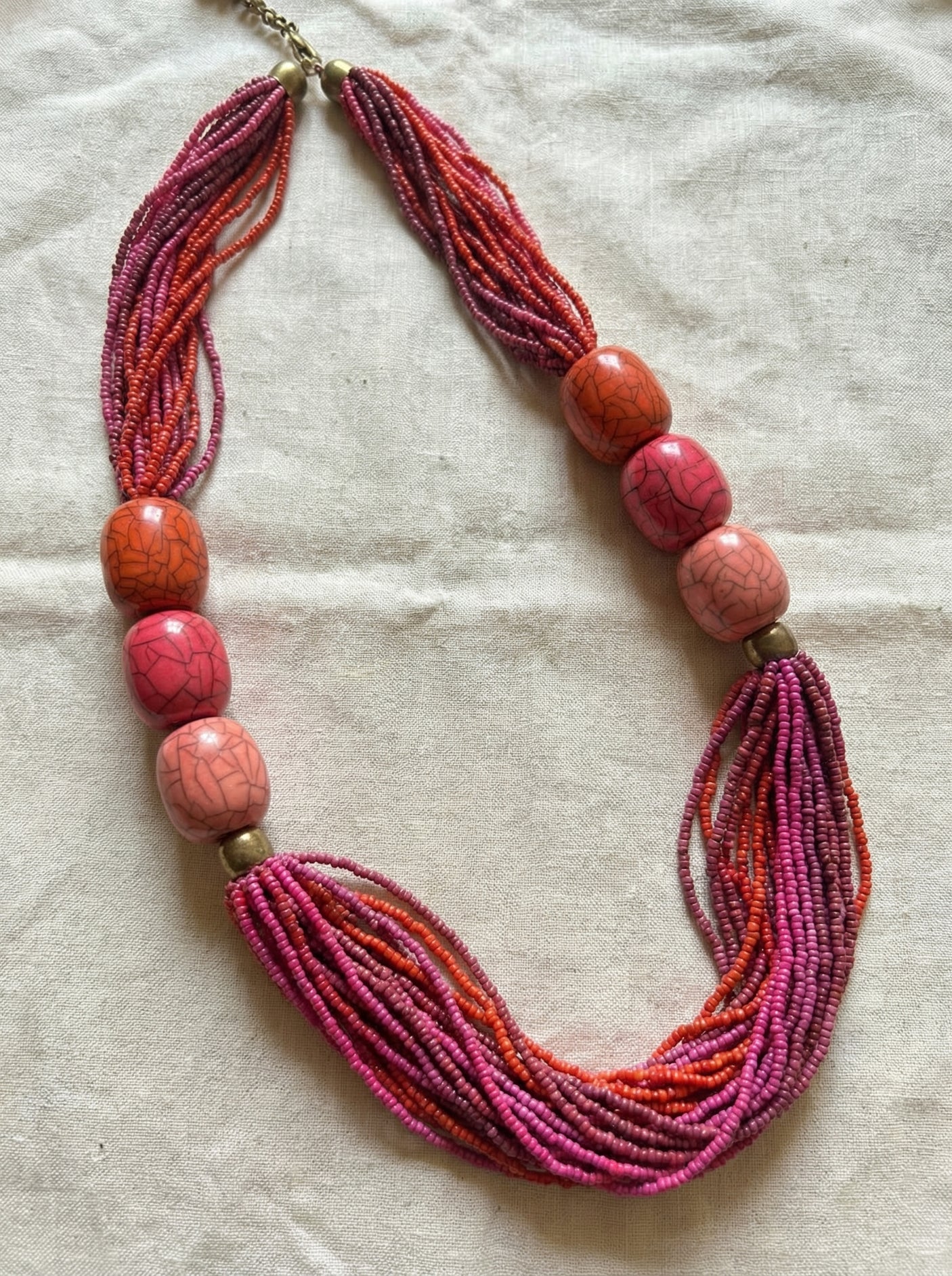 Multi-Strand Pink Seed Bead Necklace with Oversized Crackle Beads