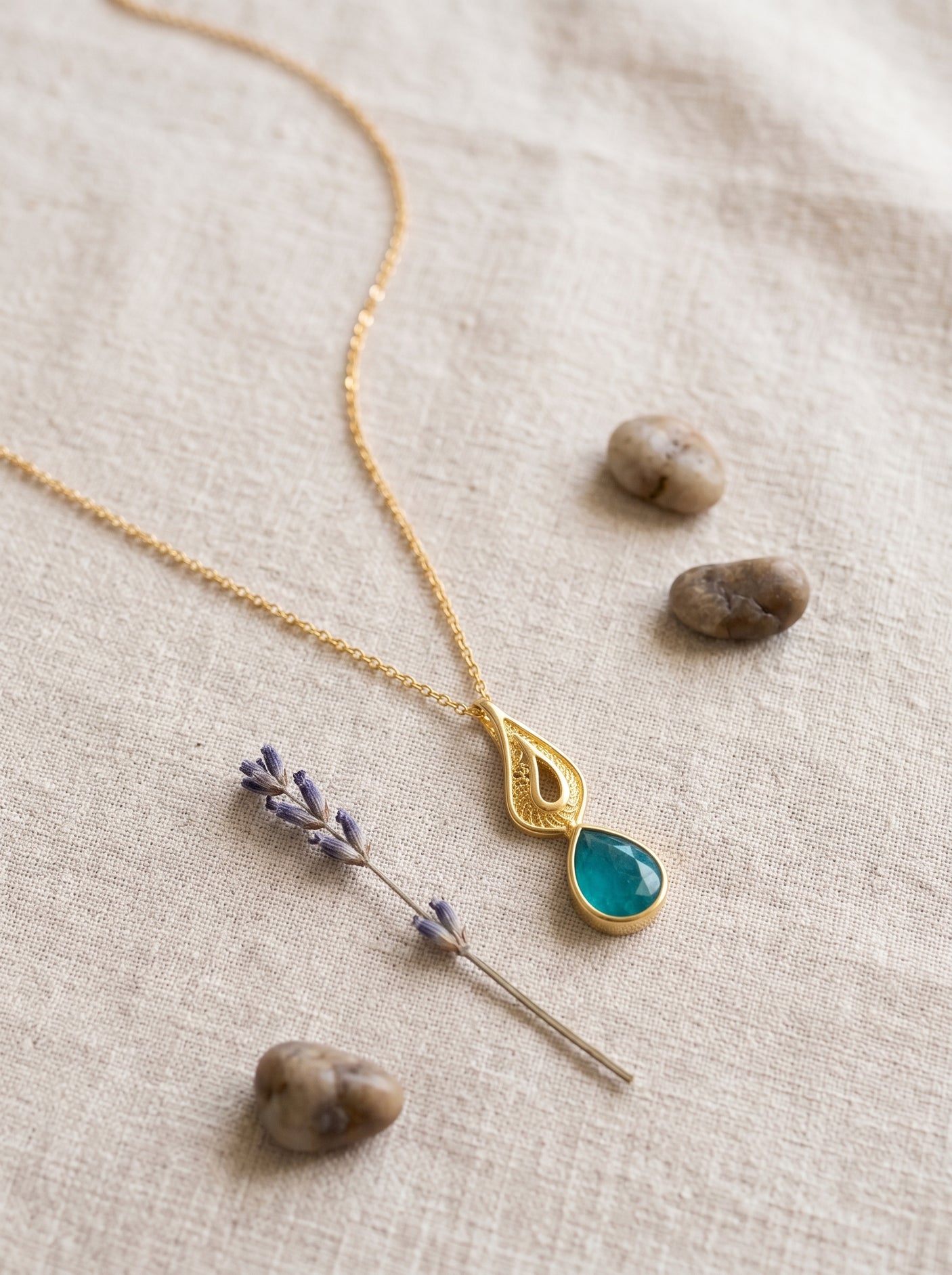 Nature Inspired Gold Pendant Necklace with Blue Crystal