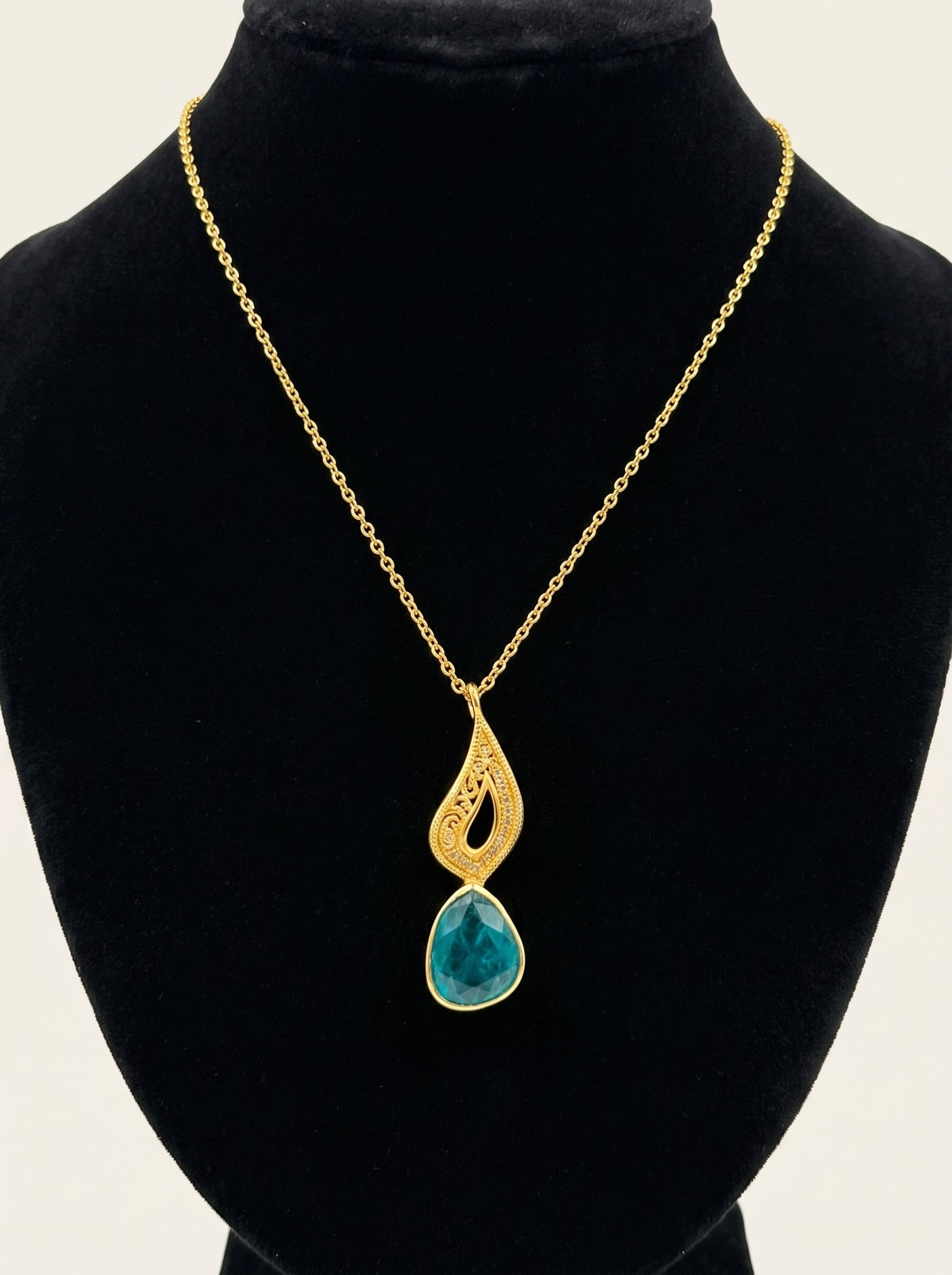 Nature Inspired Gold Pendant Necklace with Blue Crystal