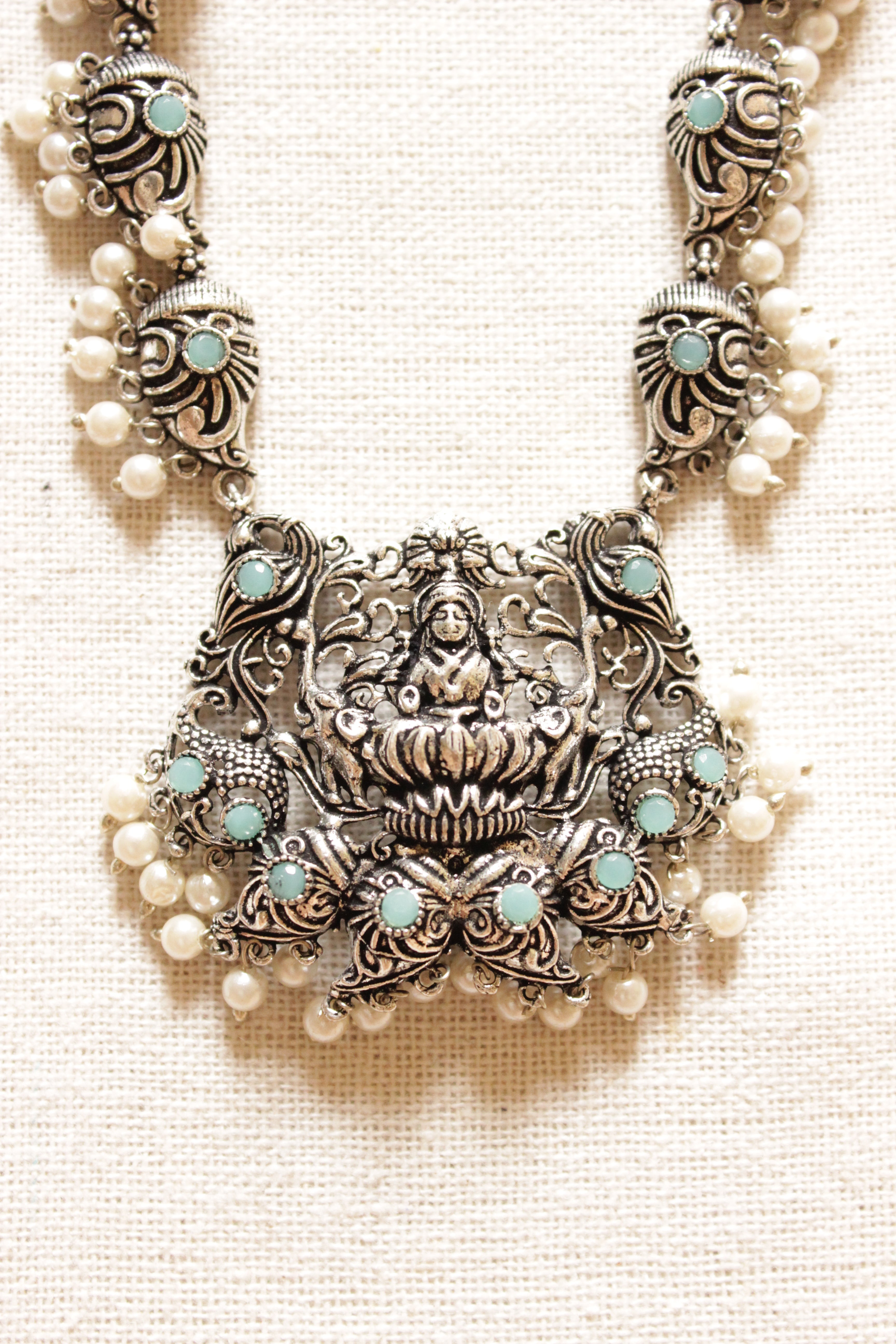 Oxidised Finish Premium Turquoise Stones Embedded Religious Motif Long Brass Necklace Set