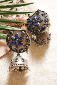 Premium Oxidised Finish Blue Stones Embedded White Beads Embellished Jhumka Earrings