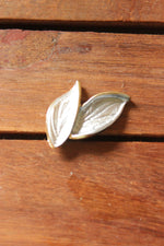 Load image into Gallery viewer, Silver Toned Leaf Shaped Stud Earrings
