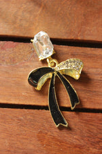Load image into Gallery viewer, Bow Shaped Gold Toned Glass Stone Embedded Stud Earrings
