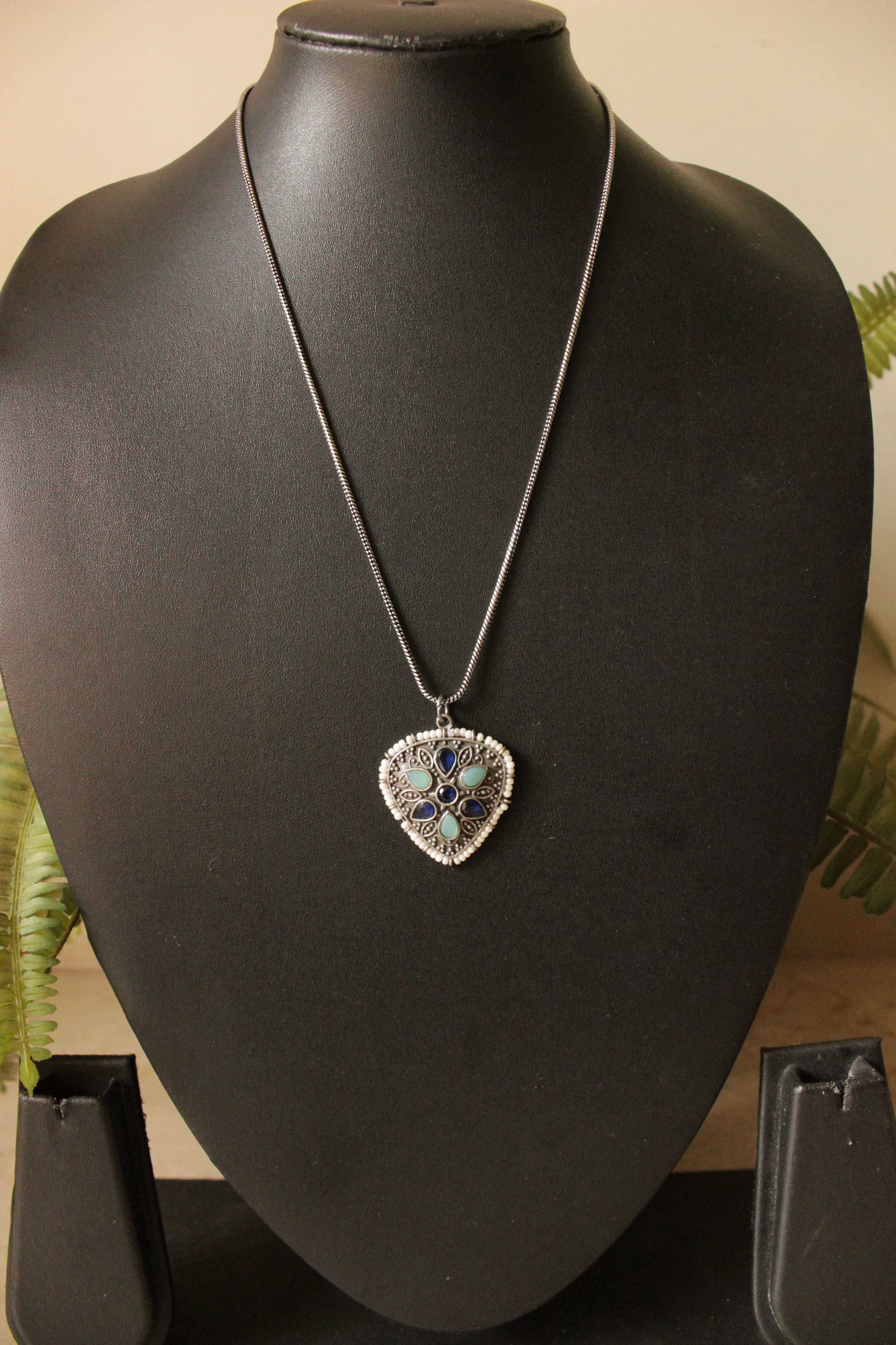 Premium Oxidised Finish Metal Pendant Necklace Embedded with Turquoise & Purple Stones