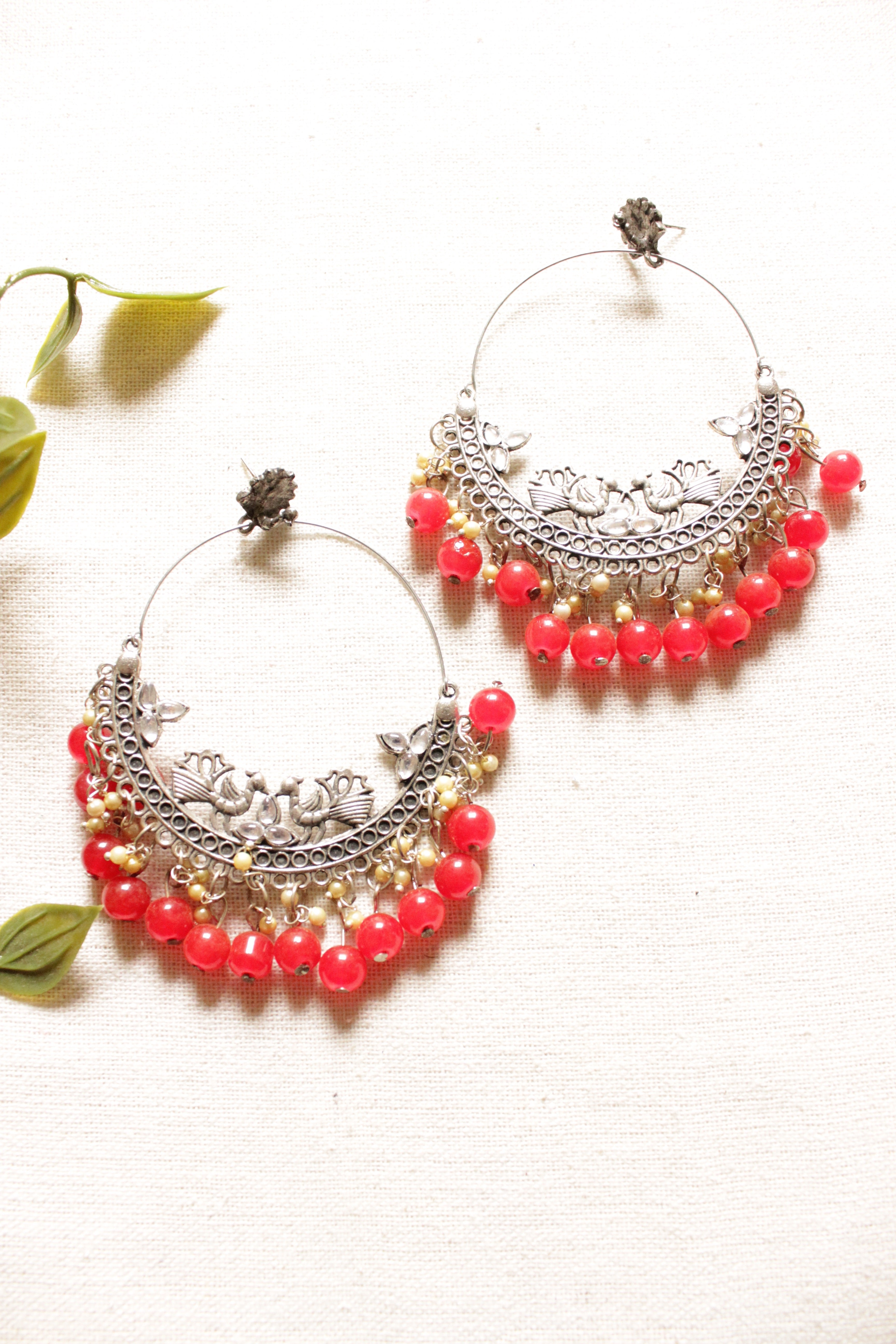 Peacock Motif Oxidised Finish Chandbali Earrings with Red Beads