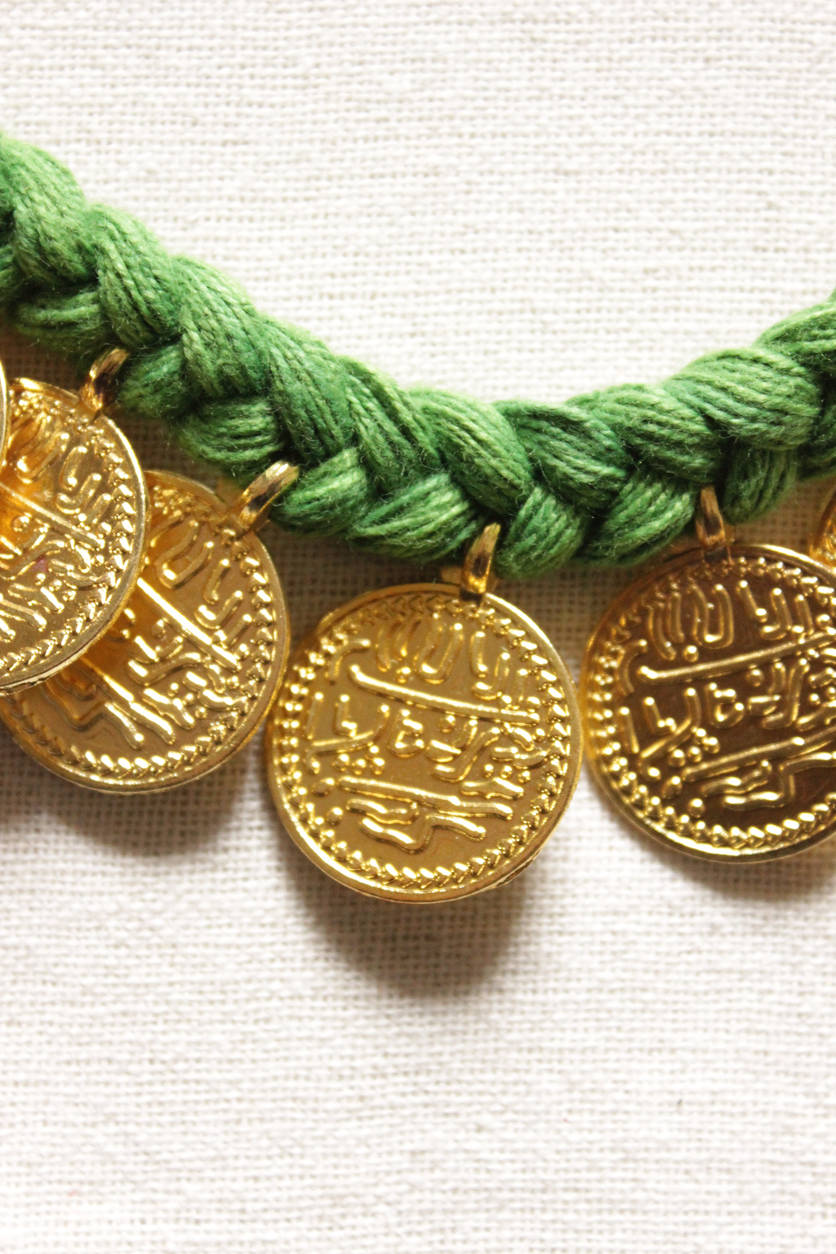 Gold Embossed Coins Braided in Green Threads Fabric Necklace