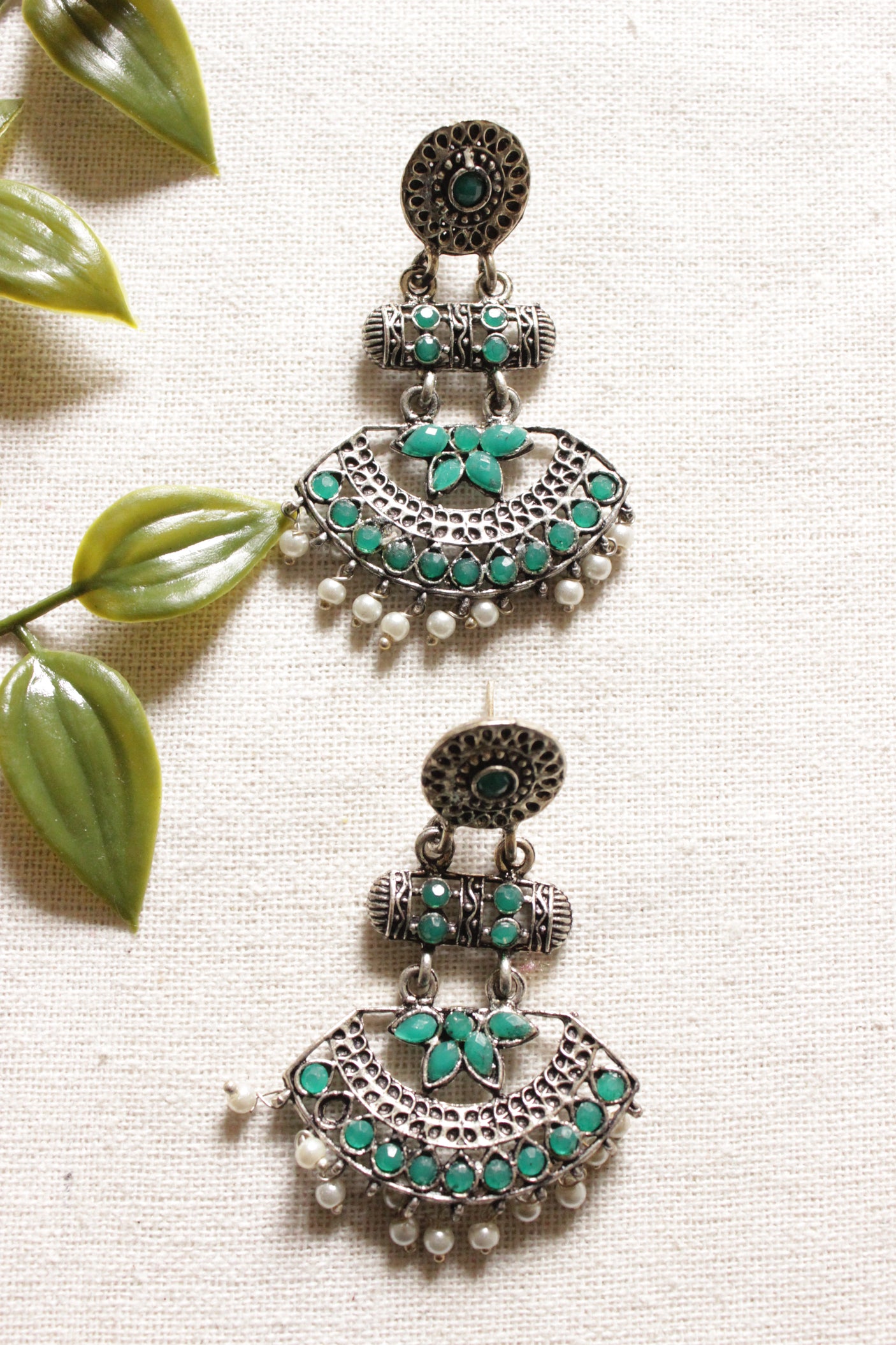 Oxidised Finish Green Stones Embedded Elaborate Ethnic Earrings