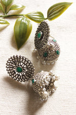 Load image into Gallery viewer, Jaali Pattern Green Center Stone Silver Finish Jhumka Earrings

