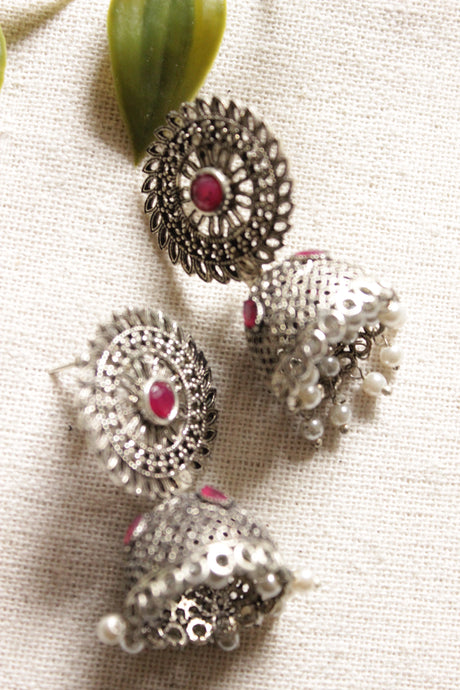 Jaali Pattern Pink Center Stone Silver Finish Jhumka Earrings