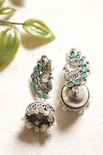 Load image into Gallery viewer, Peacock Shape Oxidised Finish Green Glass Stones Embedded Jhumka Earrings
