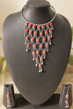 Load image into Gallery viewer, Coral Red Glass Stones Embedded Silver Finish Choker Style Jaali Pattern Long Necklace Set
