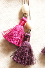 Purple Flower Shape Dangler Earrings with Pink and Purple Pom Pom Strings