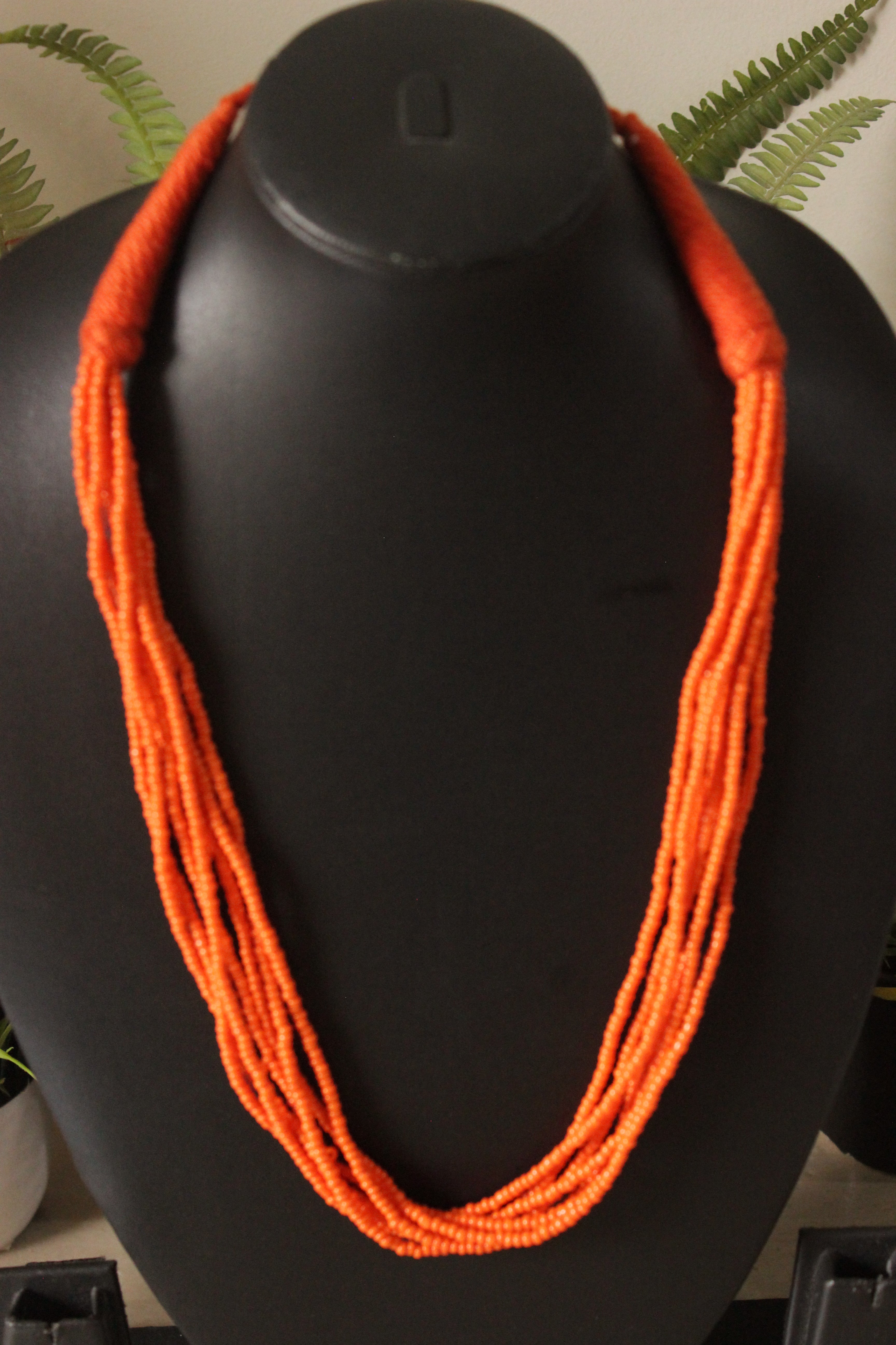 Orange Beads Braided in Fabric Threads Necklace