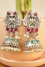 Load image into Gallery viewer, Ruby Red &amp; Green Natural Gemstones Embedded Intricately Detailed Brass Jhumka Earrings
