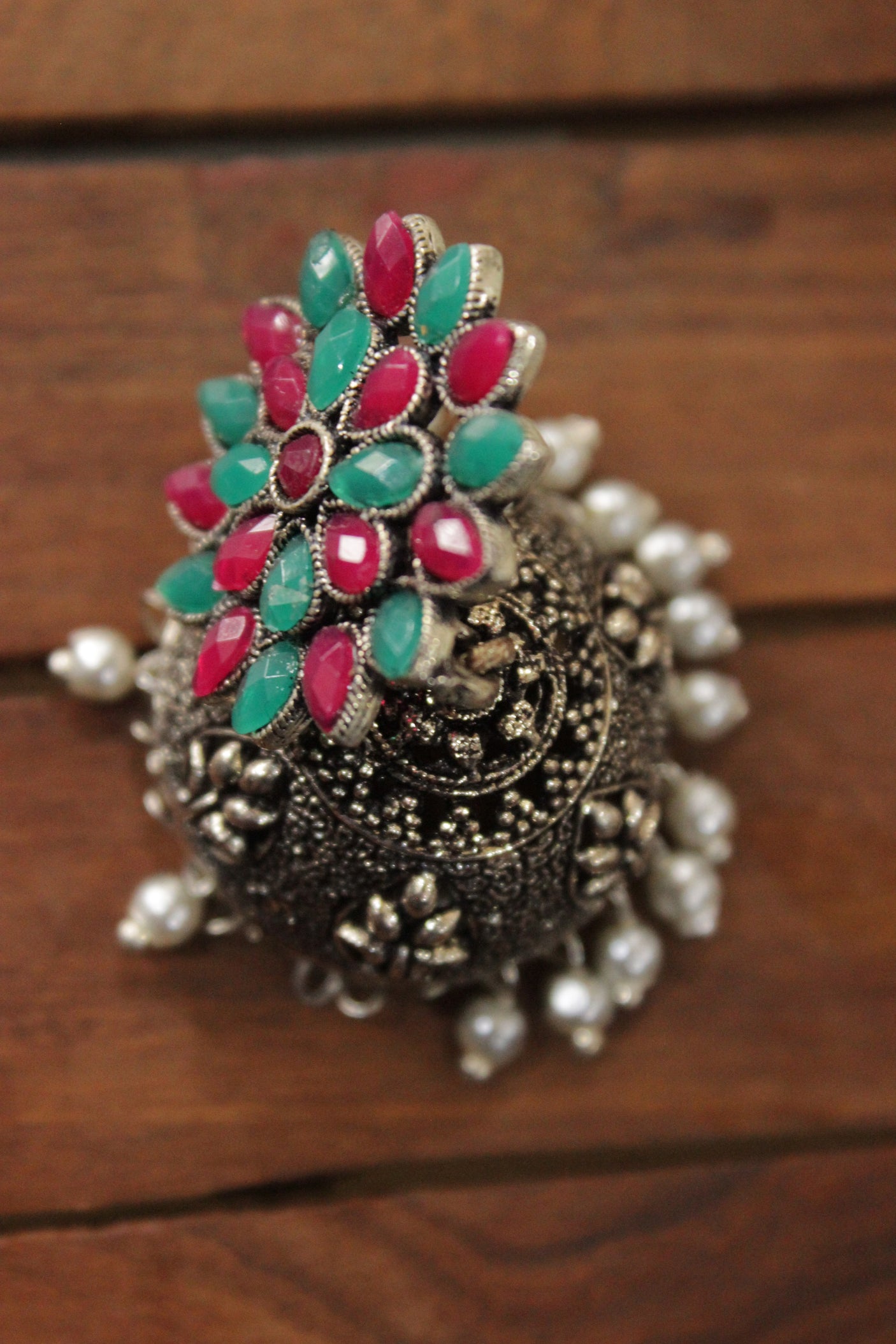 Red and Green Glass Stones Embedded Oxidised Finish Jhumka Earrings