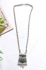 Oxidised Finish Dholki Beads German Silver Necklace with Green Center Stone