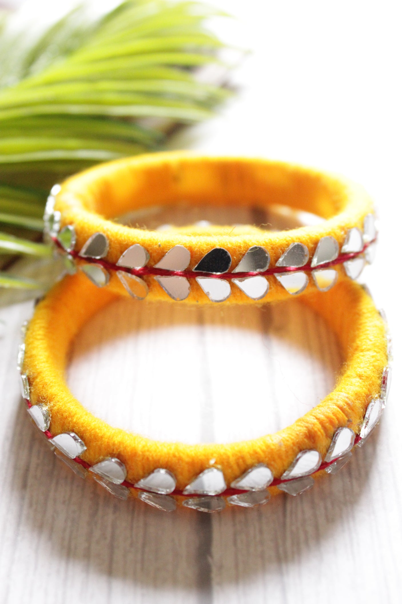 Yellow Fabric Threads and Mirror Work Metal Bangles - Set of 2