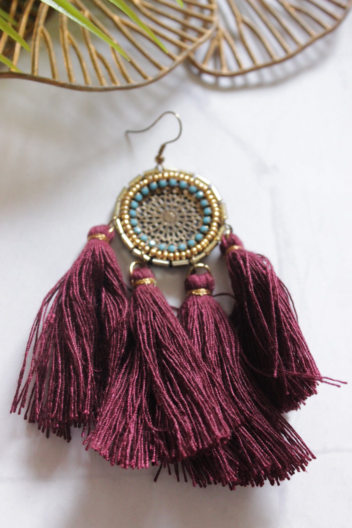 Maroon Pom Poms Embellished Beaded Dangler Earrings