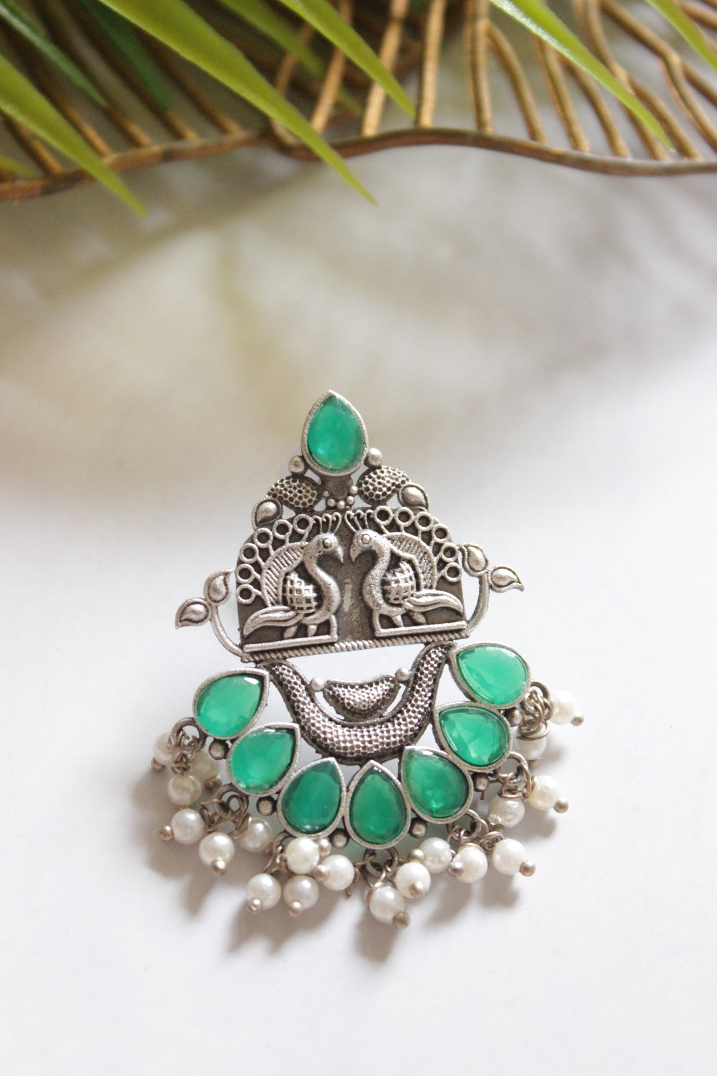 Oxidised Finish Peacock Motifs Green Stones Embedded Earrings