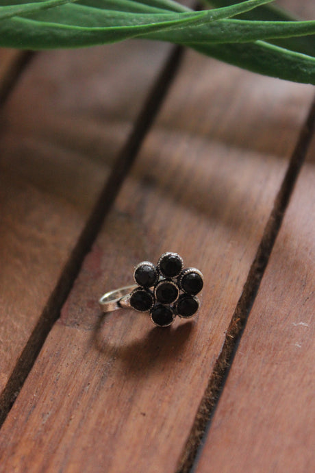 Black Stones Embedded Flower Shape Clip On Nosepin