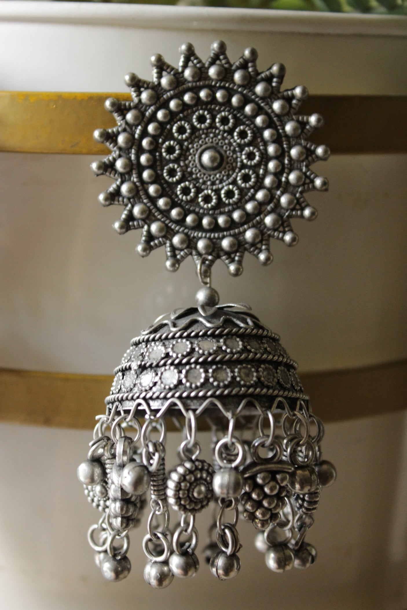 Intricately Detailed Premium Oxidised Finish Sun Dial Jhumka Earrings