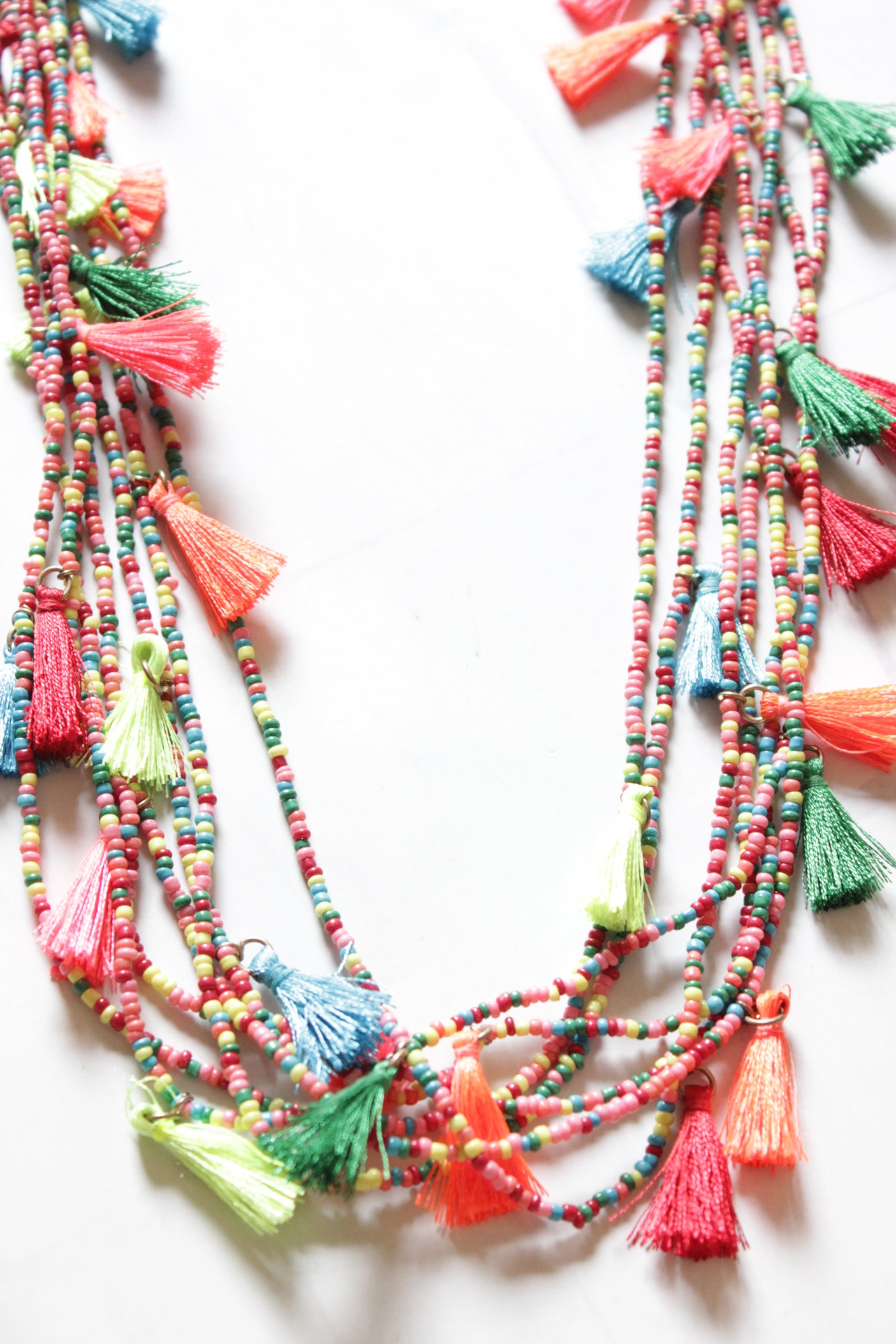 Vibrant Beaded Handmade Necklace with Pom Poms