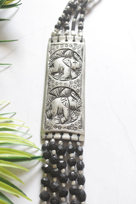 Ethnic Necklace with Black Glass Beads and Engraved Silver Plates