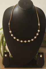 Pearls Embedded Gold Finish Hasli Choker Necklace Set