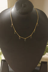 Gold-Toned Emerald and Lavender Crystal Dangle Necklace