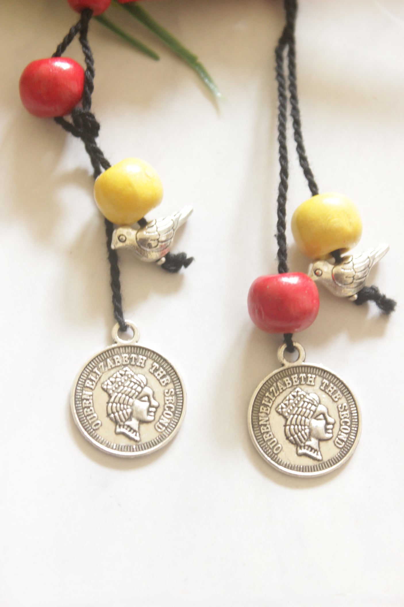Handcrafted Crimson Fabric Earrings with White Petal Motifs & Coin Charms