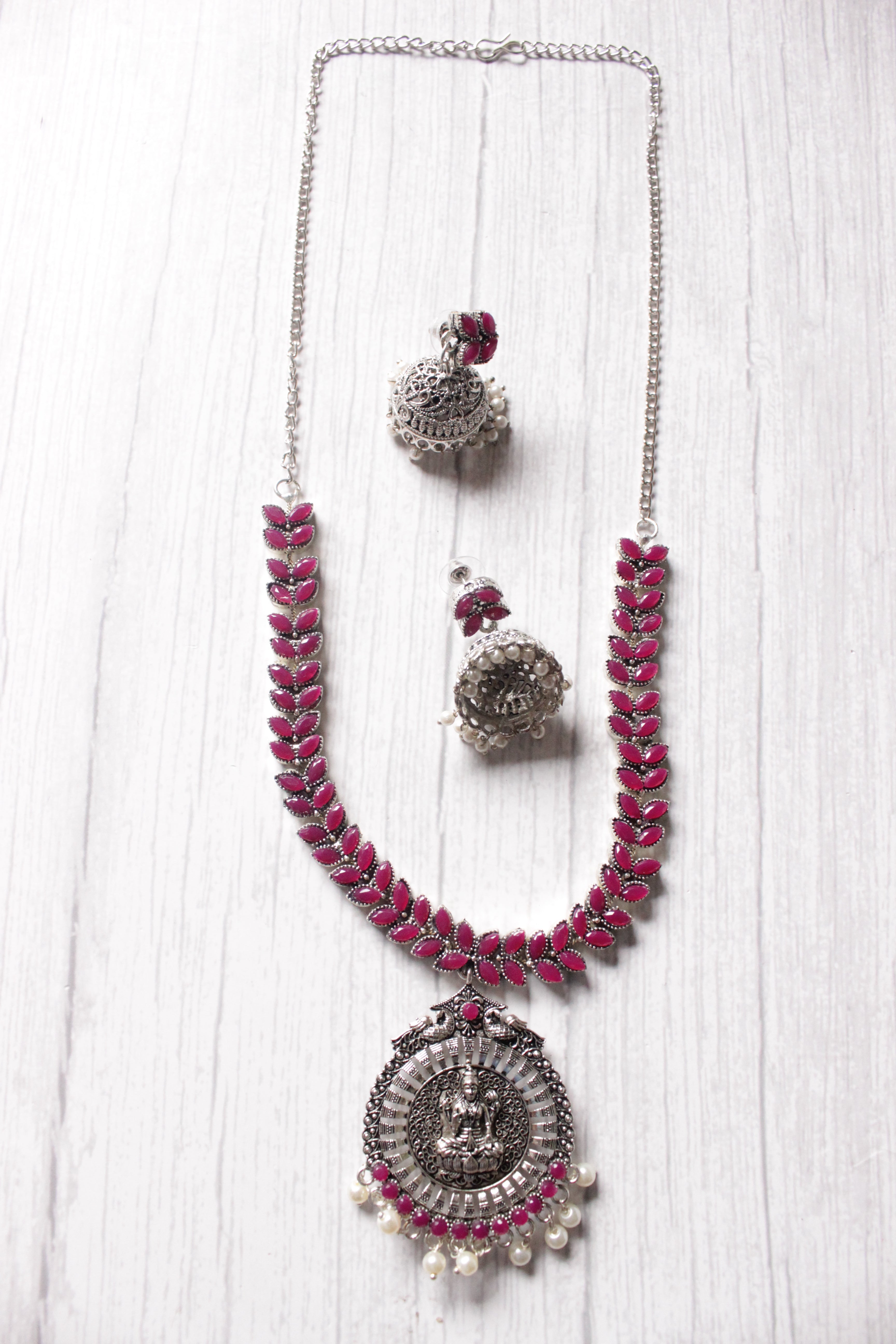 Fuchsia Glass Stones Embedded Religious Motif Adjustable Length Metal Necklace Set with Jhumka Earrings