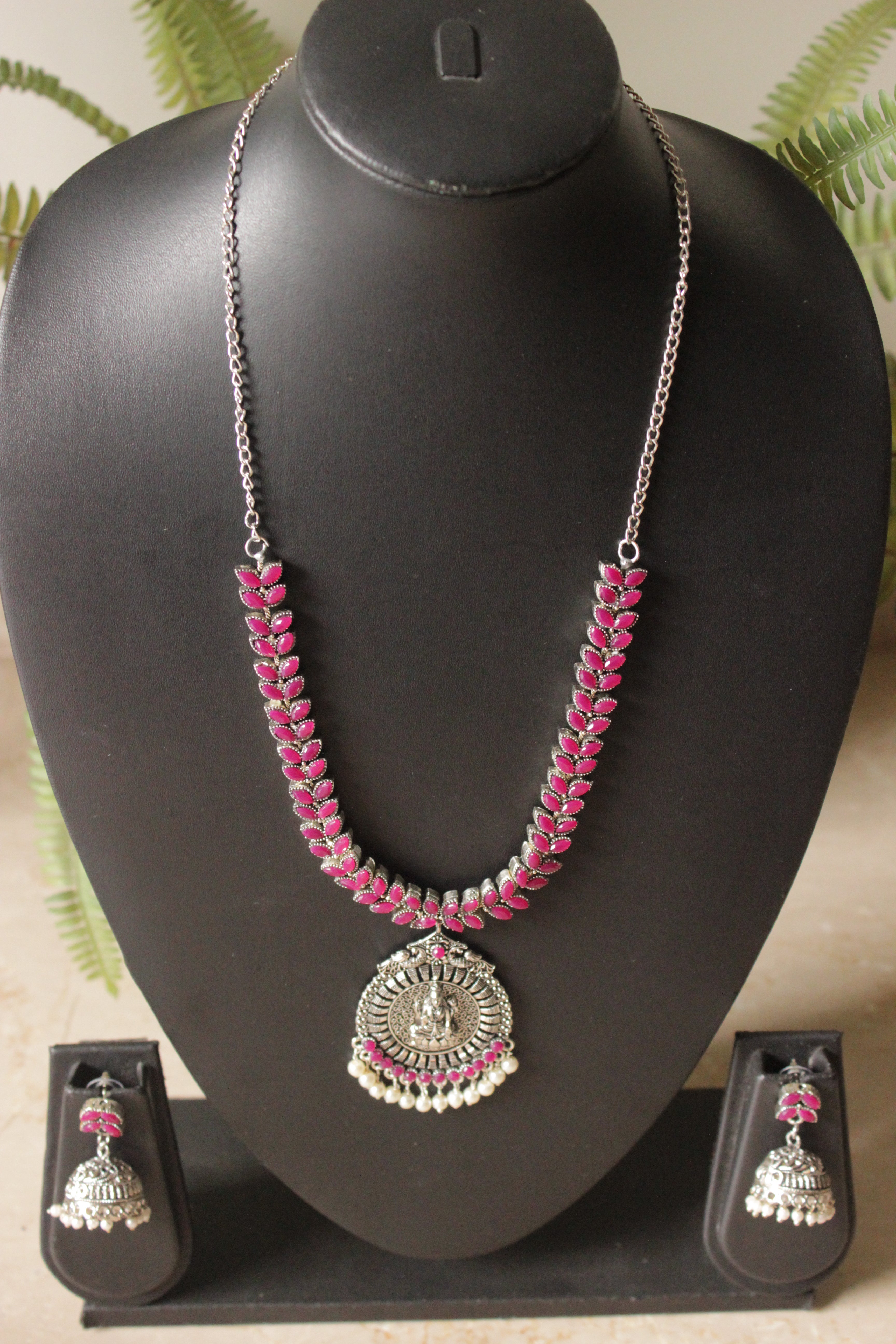 Fuchsia Glass Stones Embedded Religious Motif Adjustable Length Metal Necklace Set with Jhumka Earrings