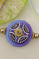 Load image into Gallery viewer, Fabric and Terracotta Clay Hand Painted Rakhi
