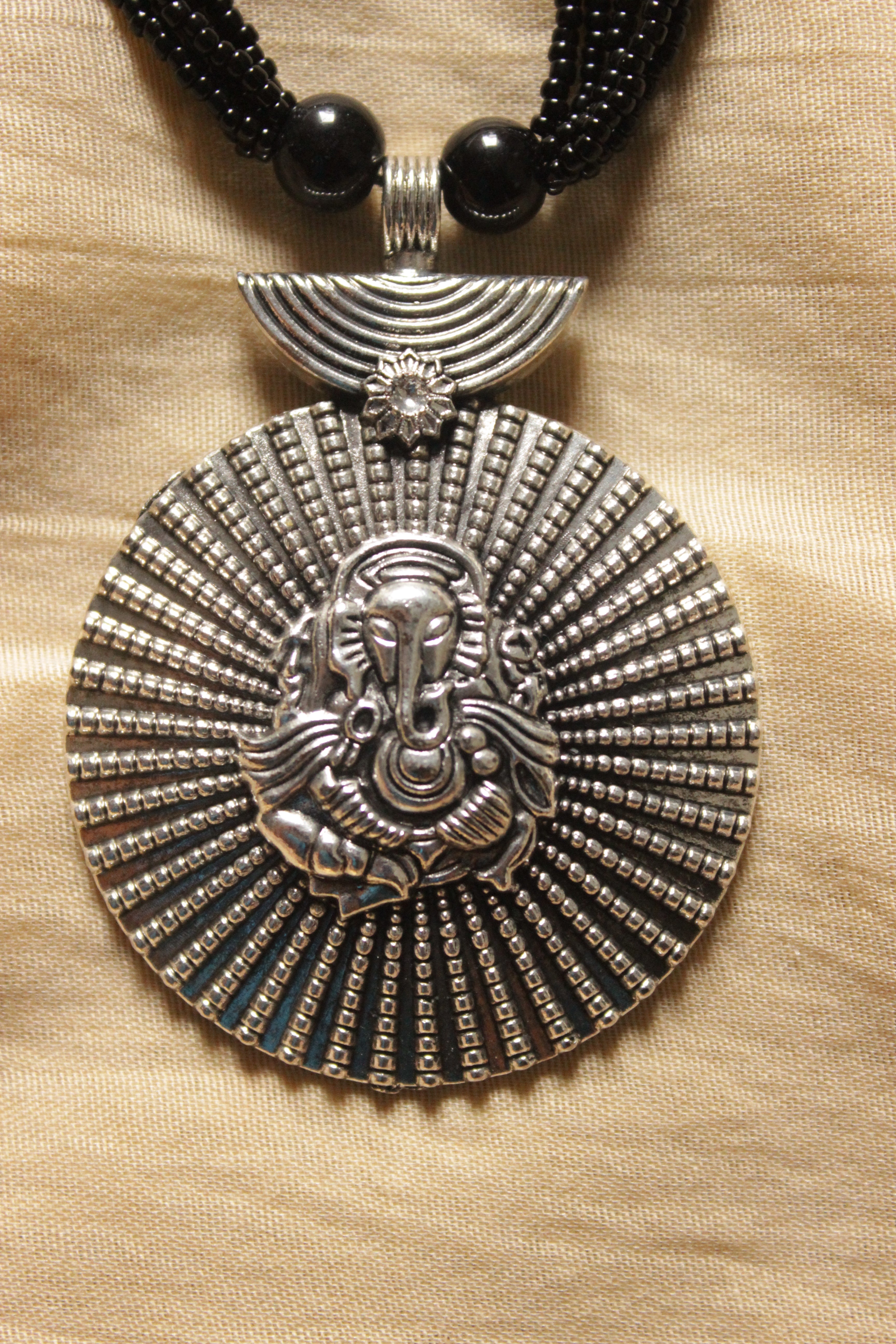 Oxidised Finish Ganesha Motif Pendant Multi-Layer Black Beads Necklace