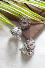 Load image into Gallery viewer, Fuchsia Glass Stones Embedded Jaali Pattern Premium Oxidised Finish Jhumka Earrings
