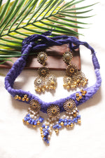 Load image into Gallery viewer, Purple Braided Threads Necklace Set Embellished with Antique Gold Finish Flower Motifs Metal Charms
