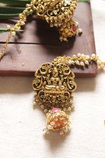 Load image into Gallery viewer, Religious Motifs Dull Gold Finish Temple Jewelry Jhumka Earrings with Ear Chain
