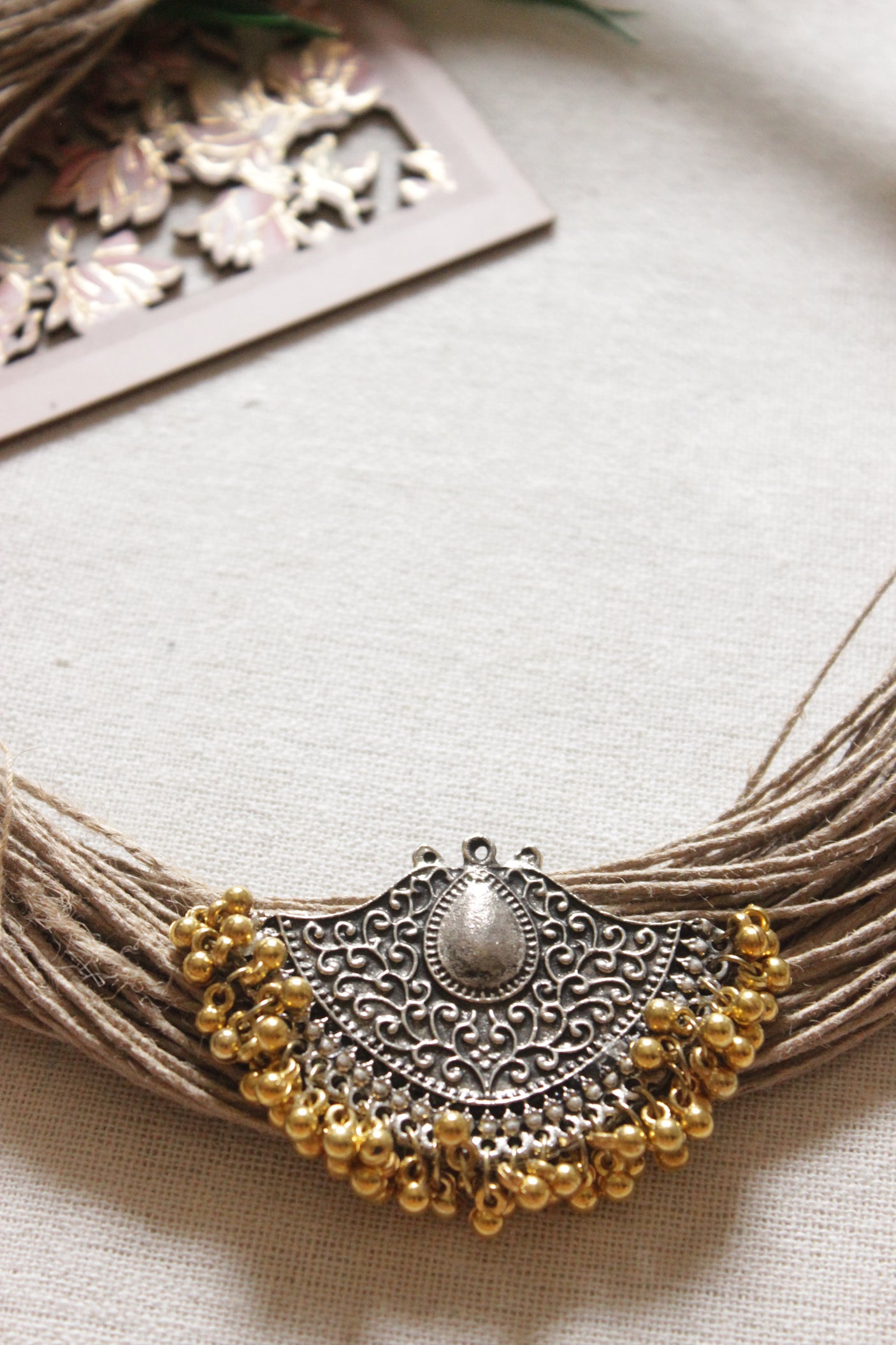 Multi Layer Handmade Jute Necklace with Dual Tone Metal Charms