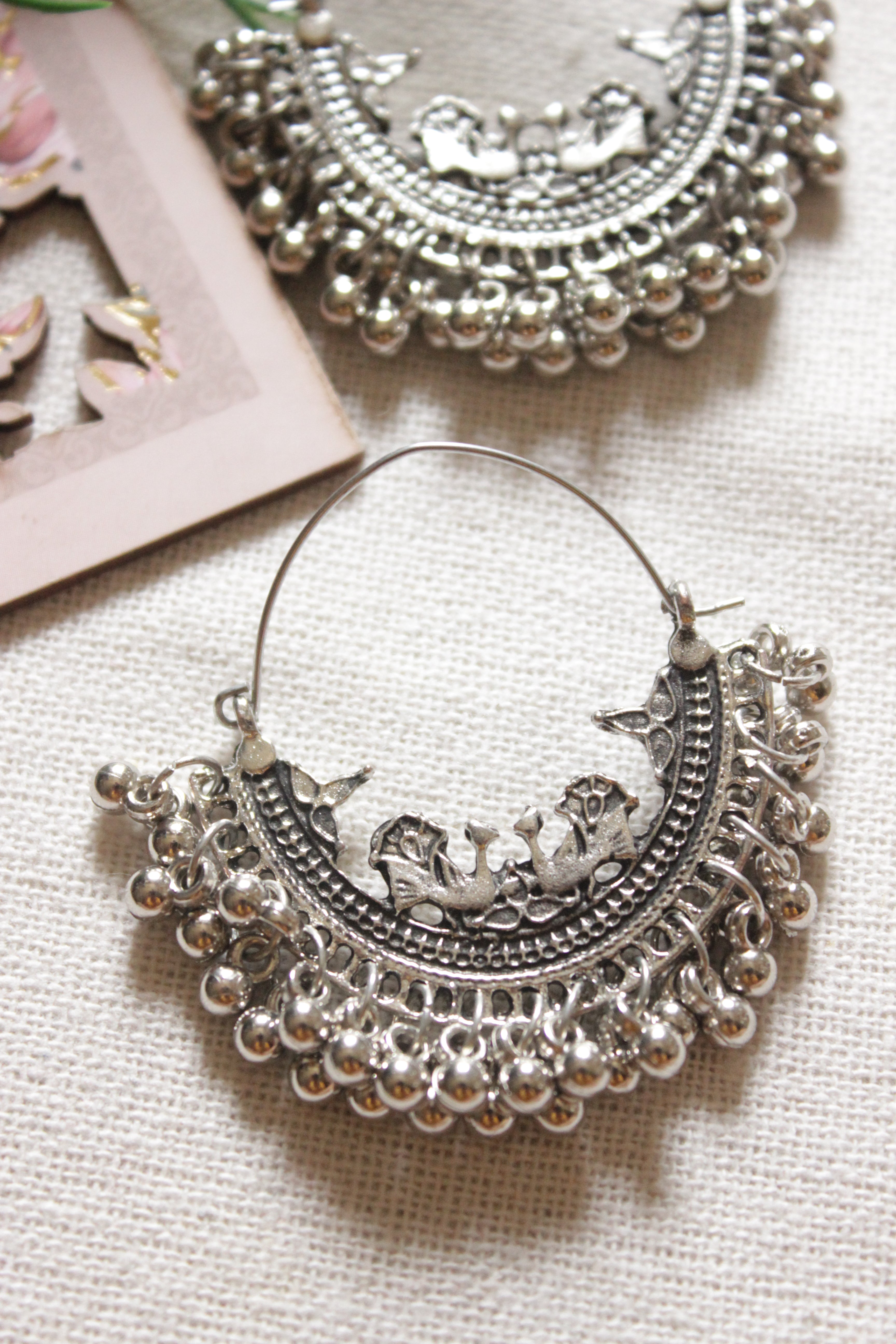 Peacock Motifs Metal Chandbali Earrings Embellished with Ghungroo Beads