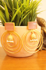 Load image into Gallery viewer, Baby Pink Natural Gemstones Embedded Gold Finish Concentric Circles Jhumka Earrings
